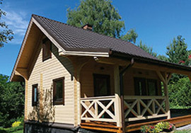 Sommarstugor gjorda av trästockar